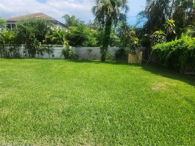 a view of a backyard with a garden