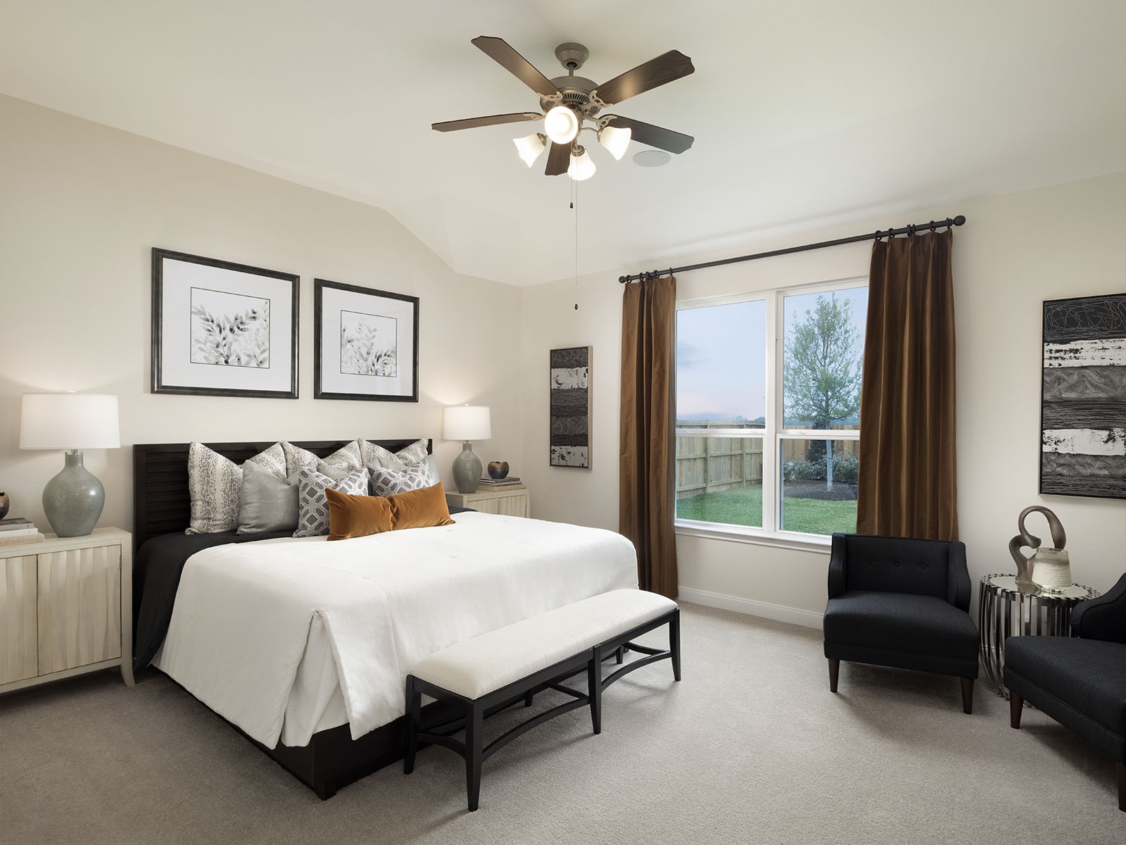 16254 Parish Pointe Court Conroe, TX 77302 - Photo 8 of 14 a bedroom with a bed and a couch next to a window