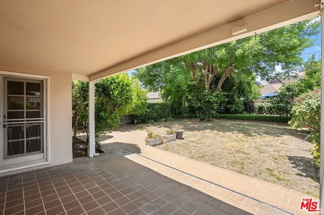 a view of backyard with hardwood