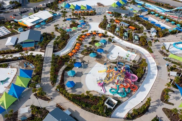 a view of street along with retail shop and buildings
