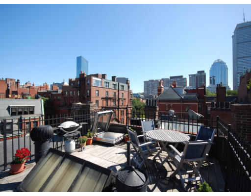 7 Fairfield Street, Unit 4 Boston, MA 02116 - Photo 11 of 13 a view of a terrace with furniture and a book