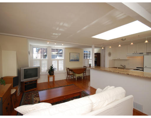 7 Fairfield Street, Unit 4 Boston, MA 02116 - Photo 2 of 13 a living room with furniture and a flat screen tv