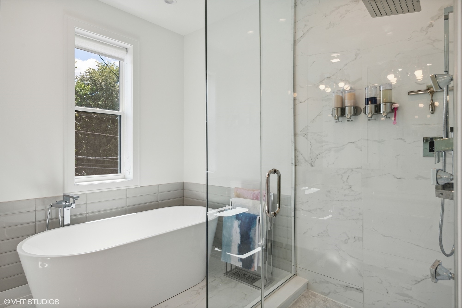 2062 North Bingham Street Chicago, IL 60647 - Photo 13 of 34 a bathroom with a bathtub and shower