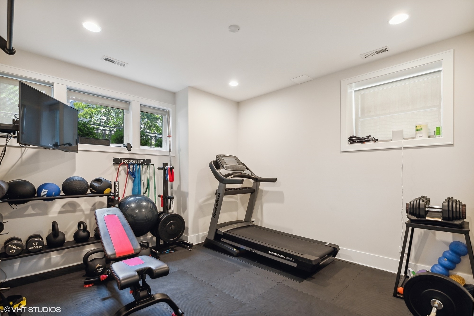2062 North Bingham Street Chicago, IL 60647 - Photo 21 of 34 a room with gym equipment and a window