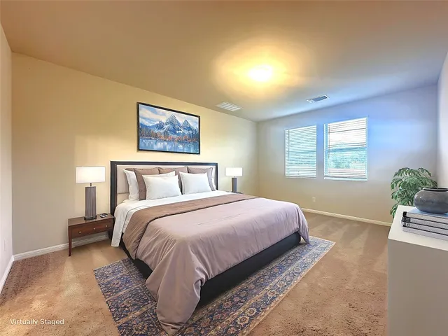 a bathroom with a granite countertop sink mirror and shower