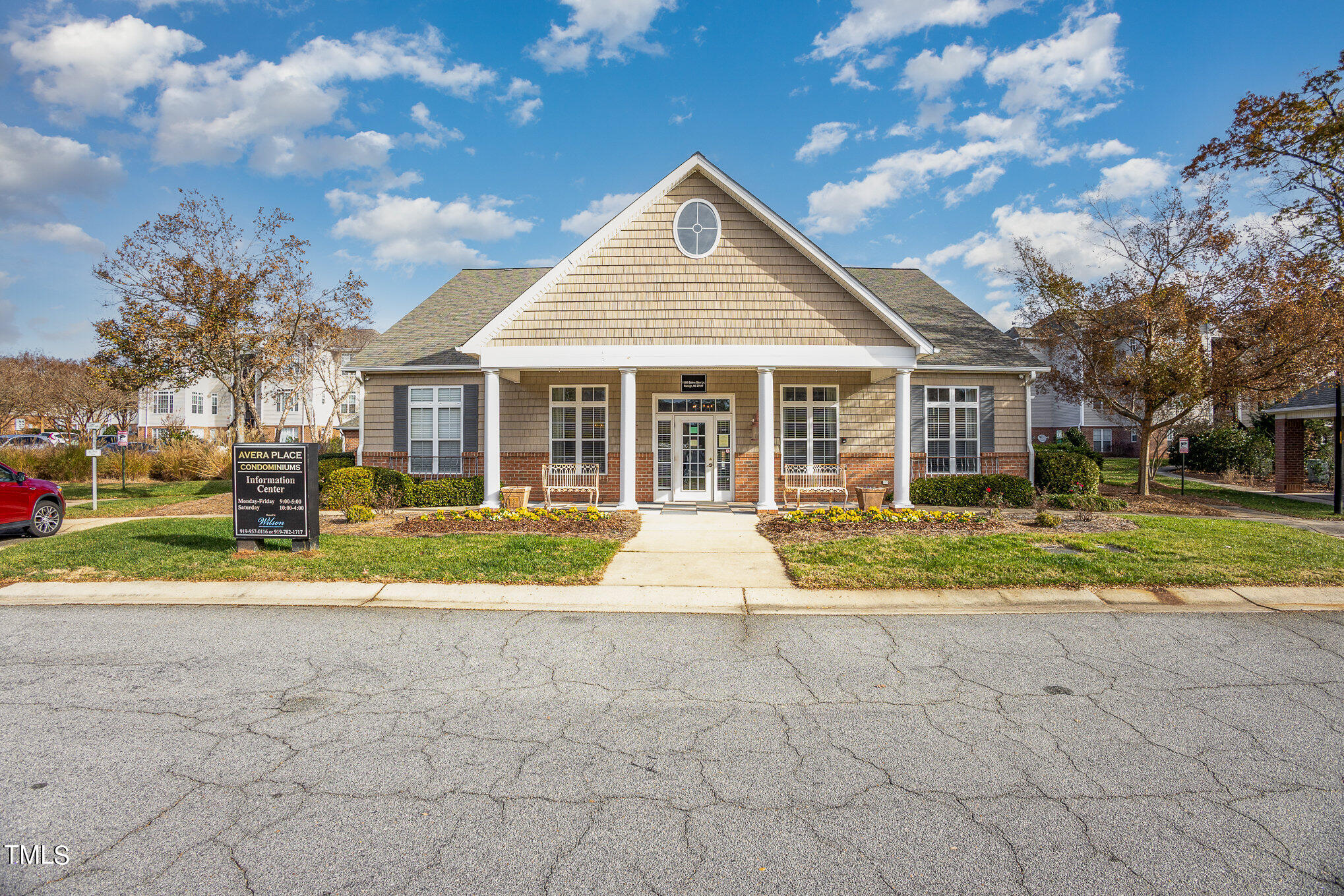 2500 Friedland Place, Unit 302 Raleigh, NC 27617 - Photo 13 of 15 a view of house in front of a big yard with large trees