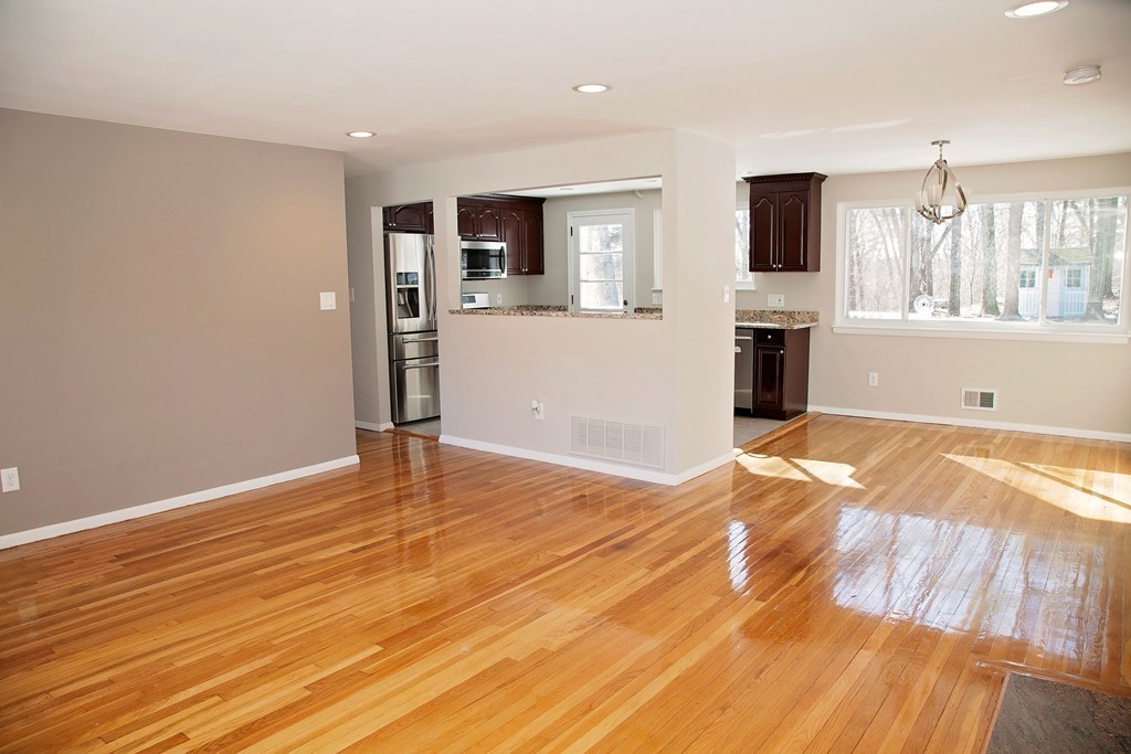14 McAdams Road Framingham, MA 01701 - Photo 3 of 15 a view of a kitchen with microwave and cabinets