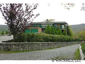 544 Brown Ridge Road Maggie Valley, NC 28751 - Photo 1 of 12 a view of a house with a yard