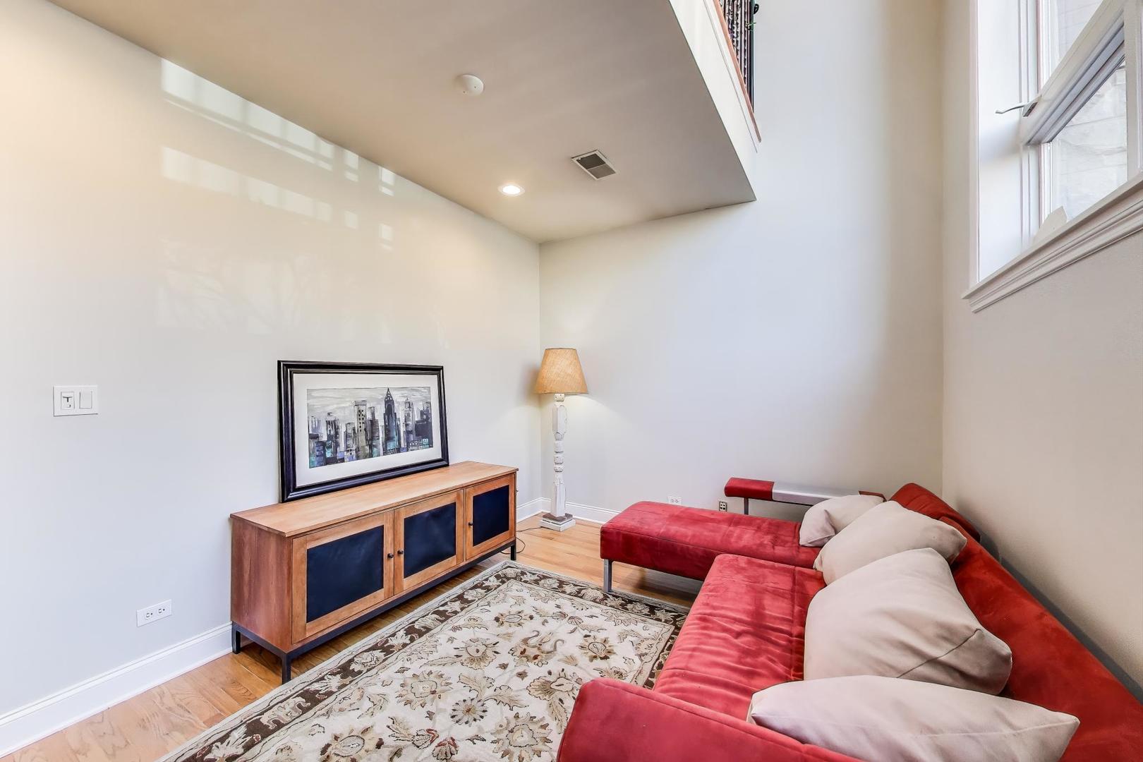 1035 West Taylor Street, Unit 1 Chicago, IL 60607 - Photo 14 of 22 a living room with furniture