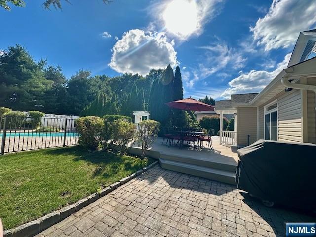 38 Totowa Road Wayne, NJ 07470 - Photo 11 of 29 a view of a backyard with couches table and chairs and potted plants