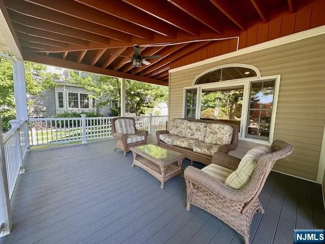 a outdoor living space with furniture and garden view