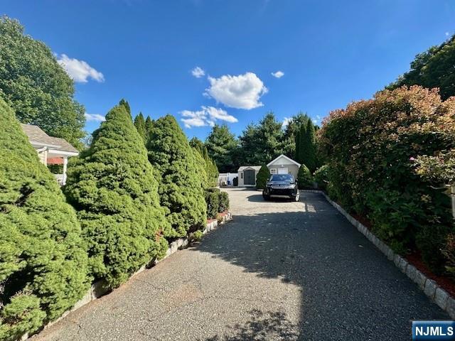 38 Totowa Road Wayne, NJ 07470 - Photo 5 of 29 a car parked on the side of the road