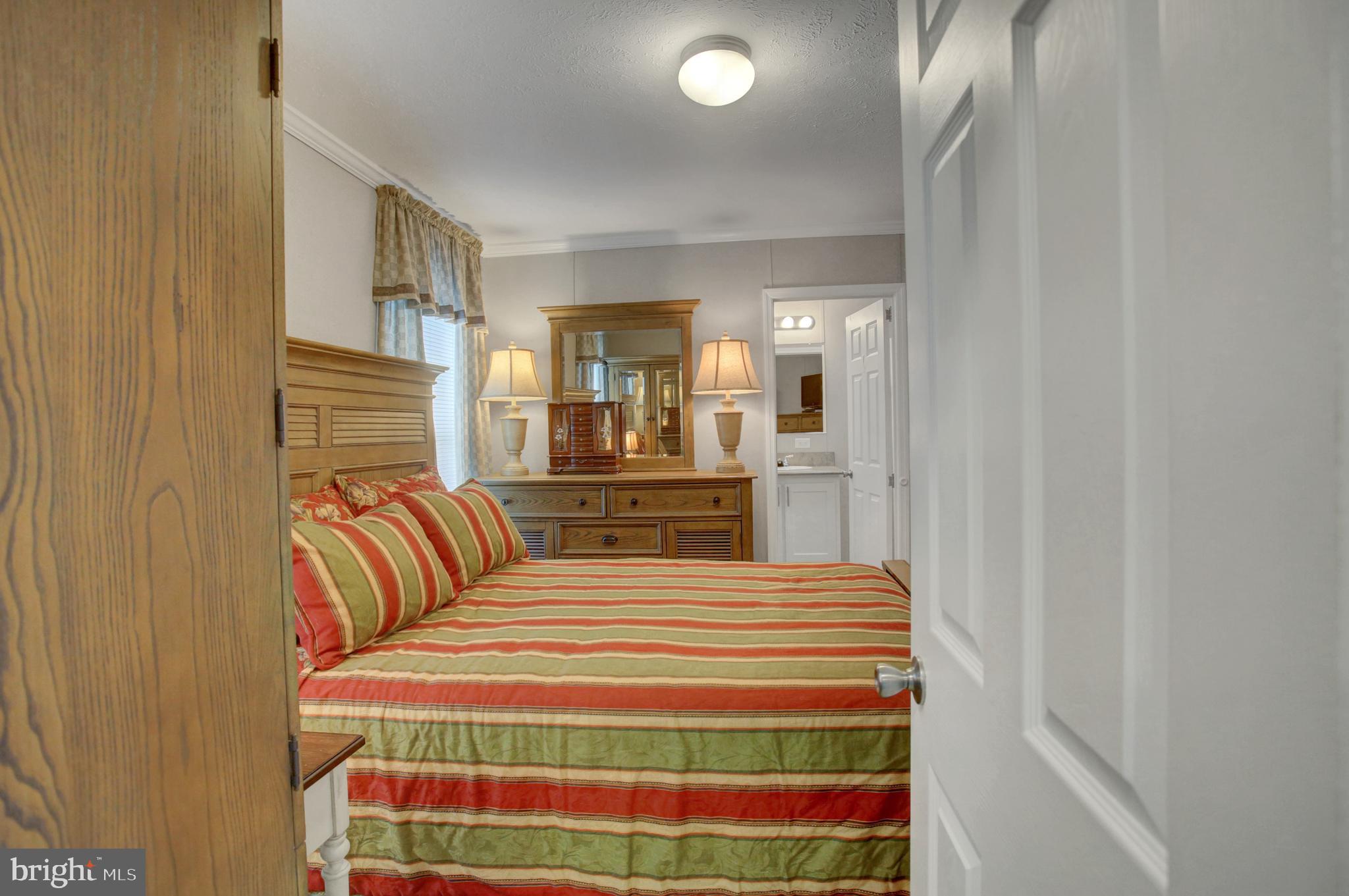 113 Big Spring Terrace Newville, PA 17241 - Photo 16 of 37 a bedroom with a bed and a mirror