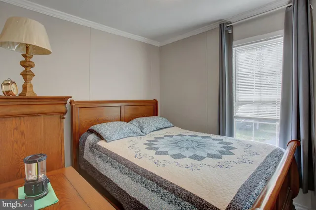 a bathroom with a sink toilet and mirror