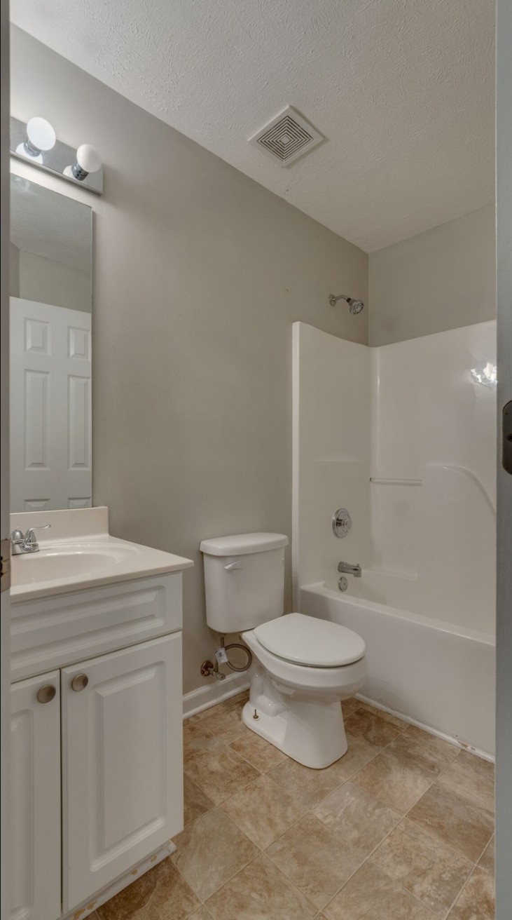 3001 Hamilton Church Road, Unit 403 Antioch, TN 37013 - Photo 9 of 21 a bathroom with a sink a toilet and shower
