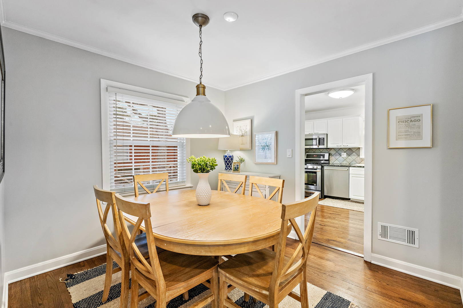 1207 Raleigh Road Glenview, IL 60025 - Photo 11 of 31 a view of a dining room with furniture window and wooden floor