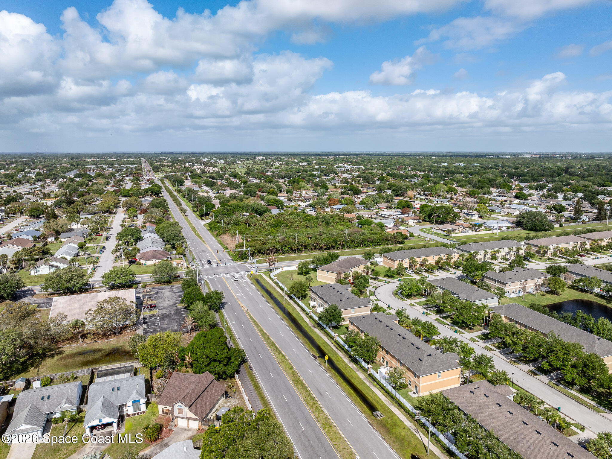 0 Lake Washington Road Melbourne, FL 32935 - Photo 8 of 14 an aerial view of residential building and lake