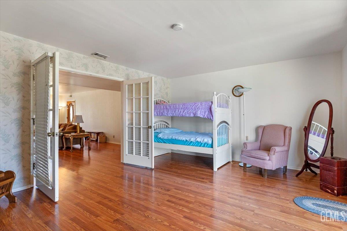 Undisclosed Address Tehachapi, CA 93561 - Photo 14 of 75 a living room with furniture a table and wooden floor