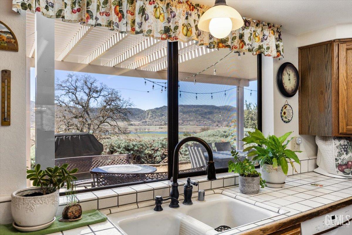 Undisclosed Address Tehachapi, CA 93561 - Photo 23 of 75 a bathroom with a vase and a sink