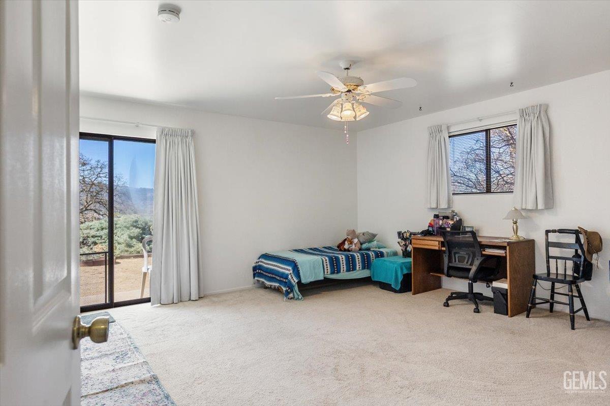 Undisclosed Address Tehachapi, CA 93561 - Photo 37 of 75 a view of a livingroom with furniture and a ceiling fan