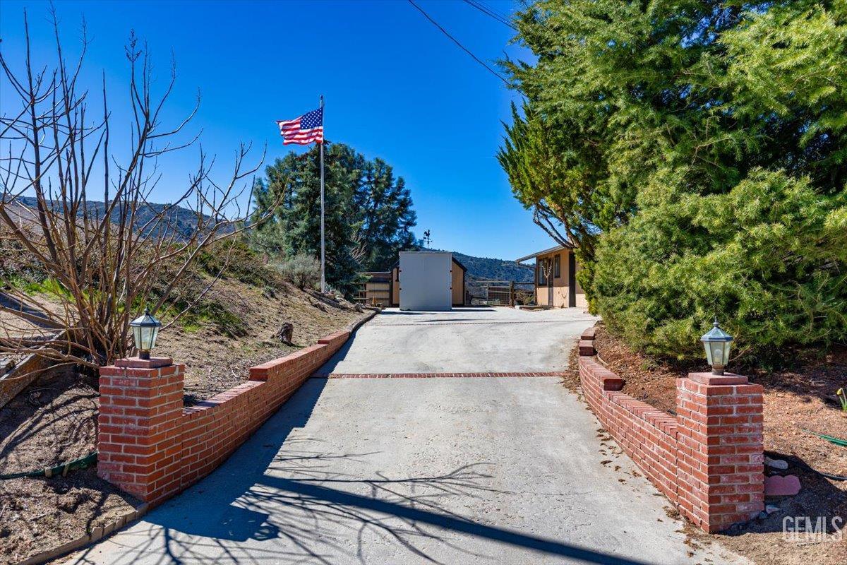 Undisclosed Address Tehachapi, CA 93561 - Photo 56 of 75 a view of a house with a yard