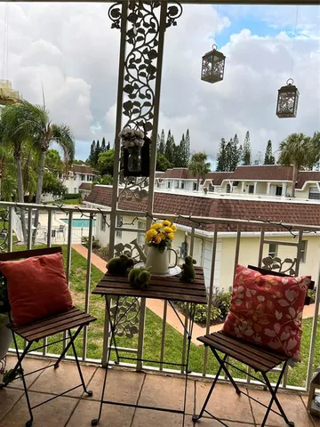 a view of a terrace with seating space