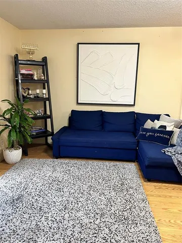 a view of wooden floor with windows