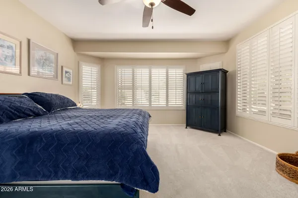 a bathroom with a granite countertop sink mirror and