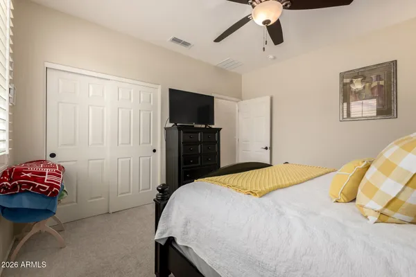 a kitchen with kitchen island granite countertop a refrigerator stove top oven and sink