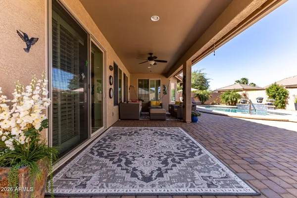 a view of a backyard with a patio