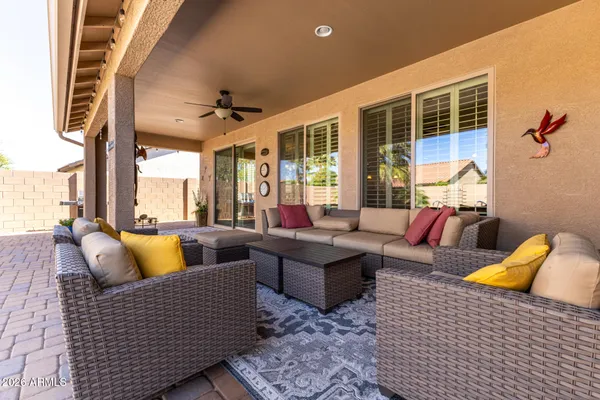 an aerial view of a house with a yard