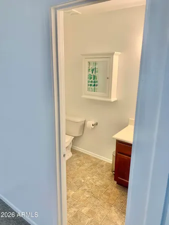 a bathroom with a toilet