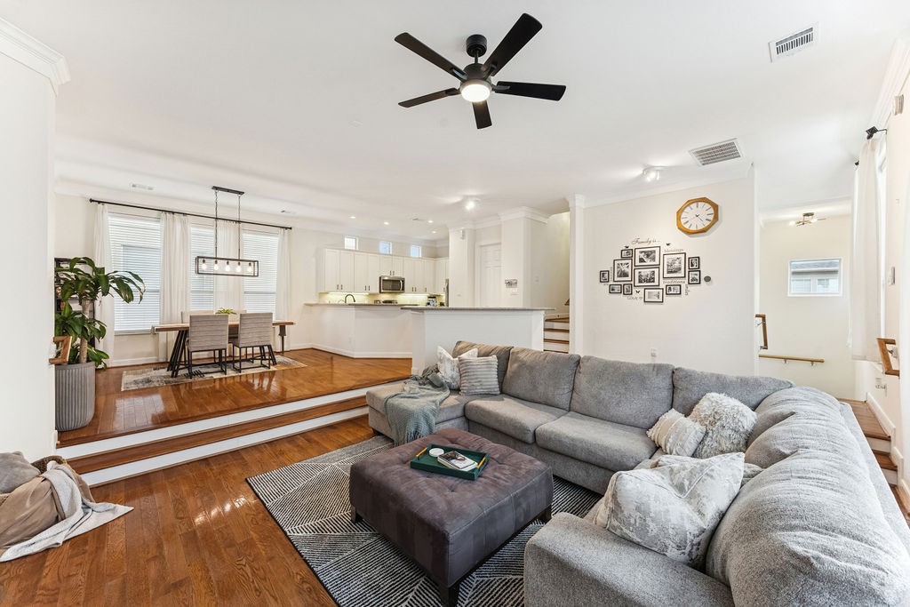 5737 Kansas Street Houston, TX 77007 - Photo 12 of 47 a living room with furniture and wooden floor