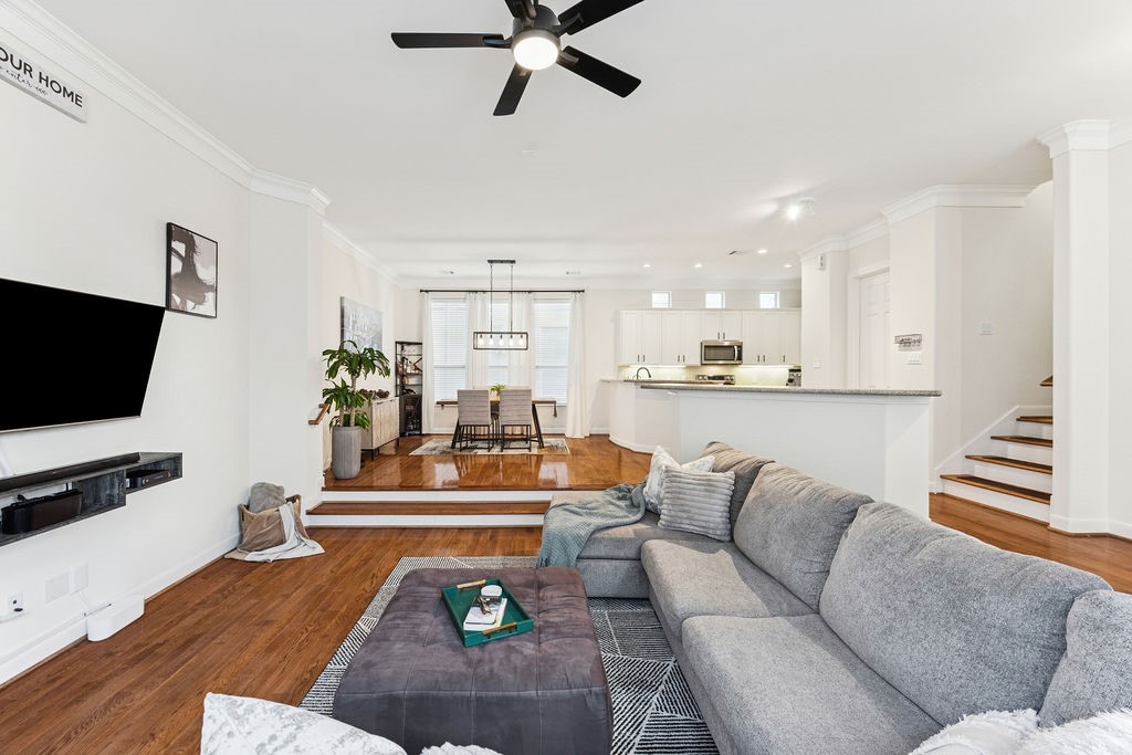 5737 Kansas Street Houston, TX 77007 - Photo 13 of 47 a living room with furniture and a flat screen tv