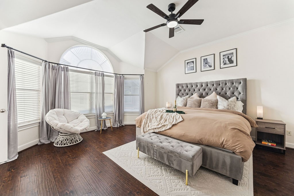 5737 Kansas Street Houston, TX 77007 - Photo 25 of 47 a bedroom with a bed couch and window