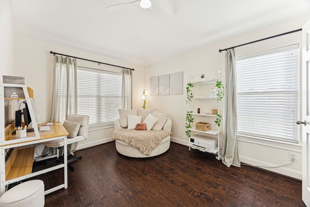 5737 Kansas Street Houston, TX 77007 - Photo 37 of 47 a living room with furniture and a large window