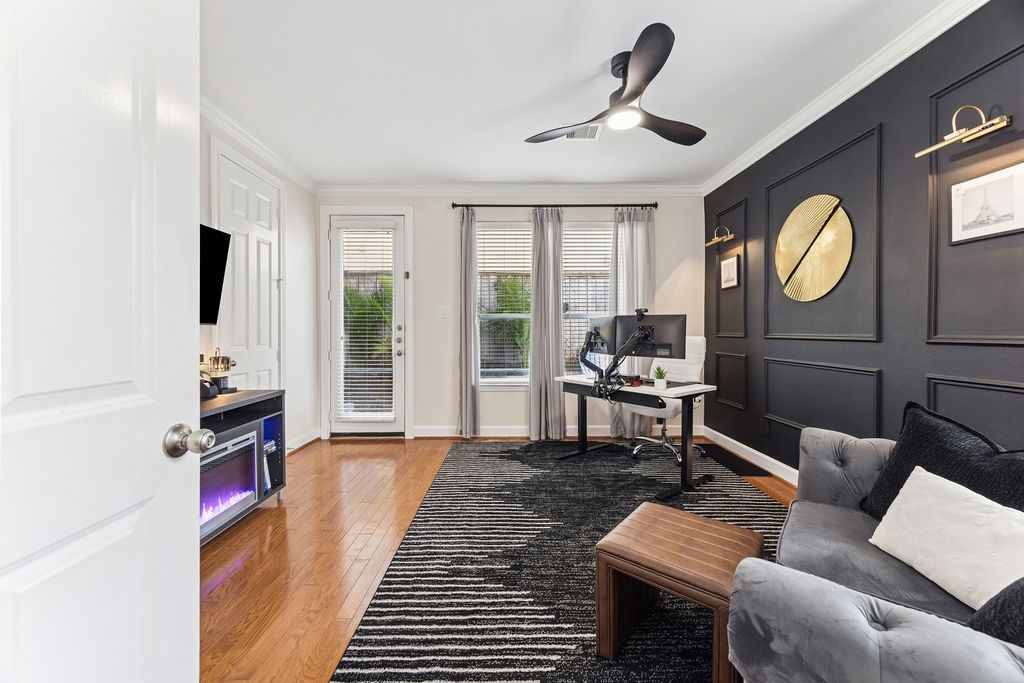 5737 Kansas Street Houston, TX 77007 - Photo 4 of 47 a living room with furniture and a flat screen tv