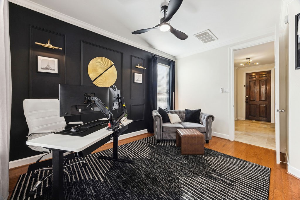 5737 Kansas Street Houston, TX 77007 - Photo 6 of 47 a living room with furniture and a wooden floor