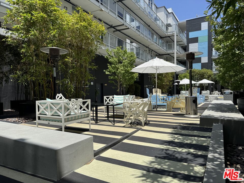 4215 Glencoe Avenue, Unit 207 Marina del Rey, CA 90292 - Photo 12 of 16 a view of a building with sitting area and furniture