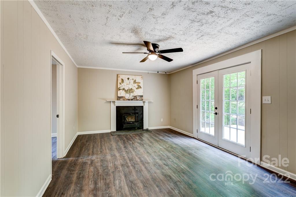 3088 Point Clear Drive Tega Cay, SC 29708 - Photo 17 of 32 a view of livingroom with hardwood floor and a ceiling fan