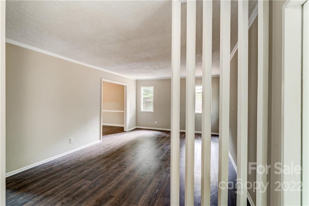 3088 Point Clear Drive Tega Cay, SC 29708 - Photo 4 of 32 a view of wooden floor and closet in an empty room