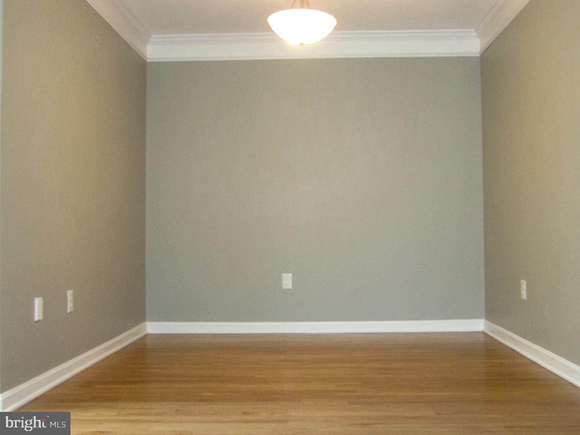 111 Spring Pl Way Annapolis, MD 21401 - Photo 17 of 64 Dining room with beautiful hardwood floors