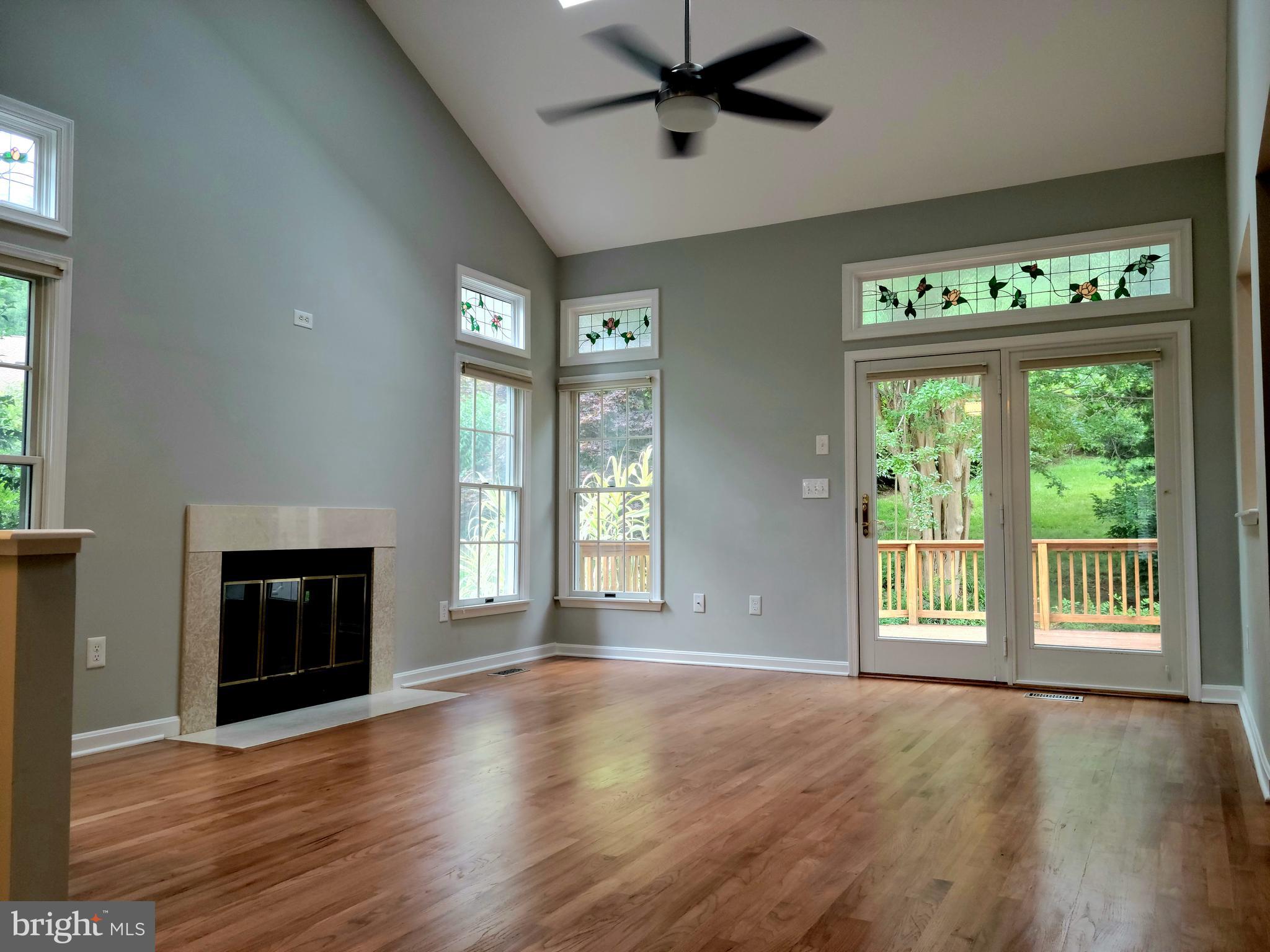 111 Spring Pl Way Annapolis, MD 21401 - Photo 5 of 64 Great room with French doors to deck with a view