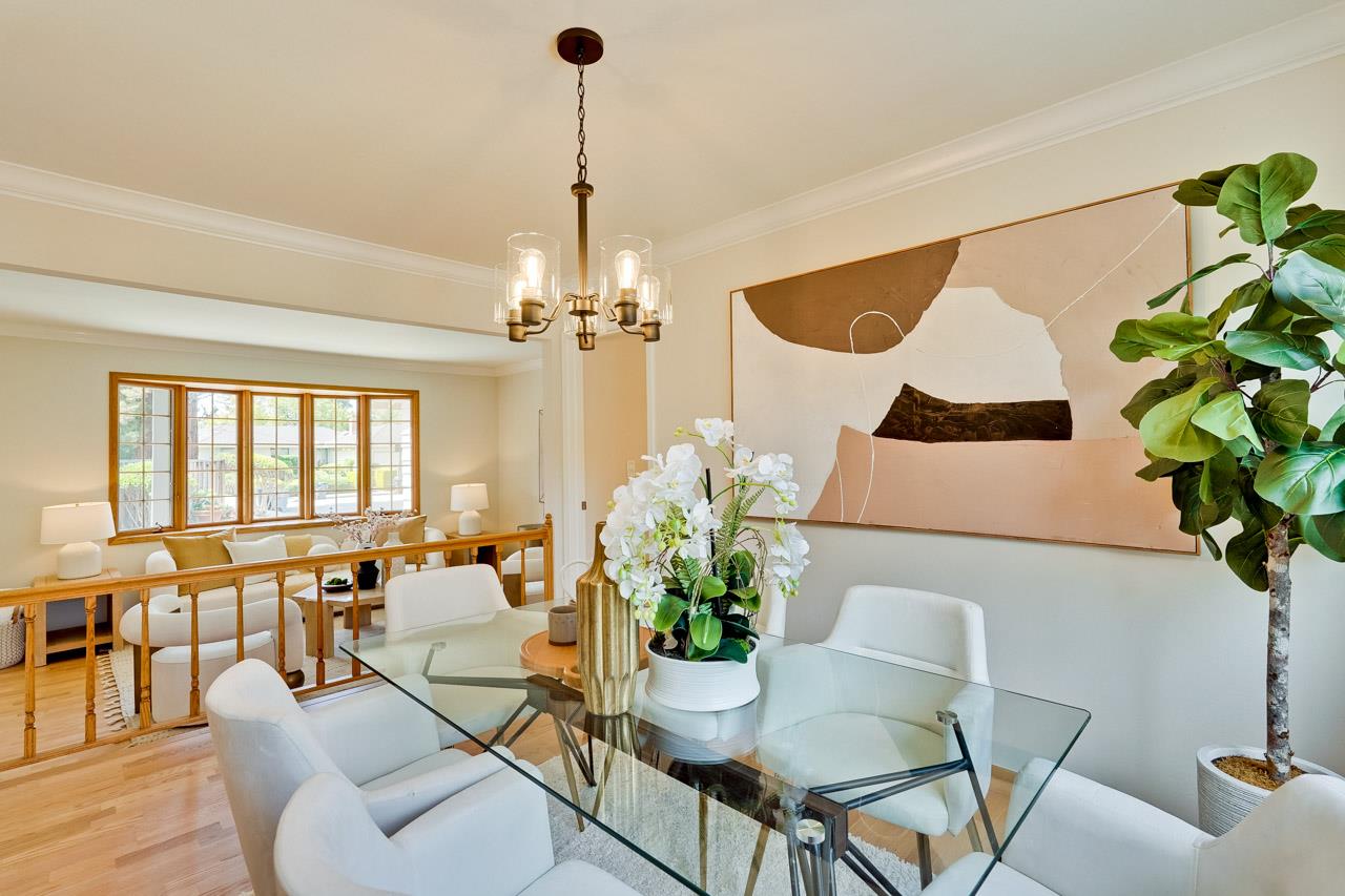 592 Torland Court Sunnyvale, CA 94087 - Photo 11 of 51 a view of a dining room and livingroom with furniture wooden floor a chandelier