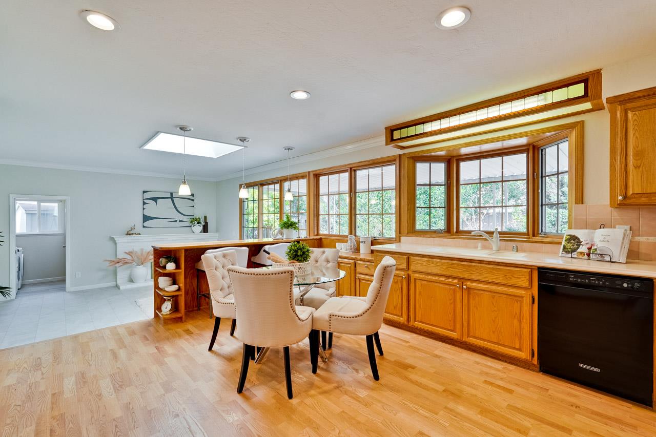 592 Torland Court Sunnyvale, CA 94087 - Photo 13 of 51 a view of a dining room with furniture window and wooden floor