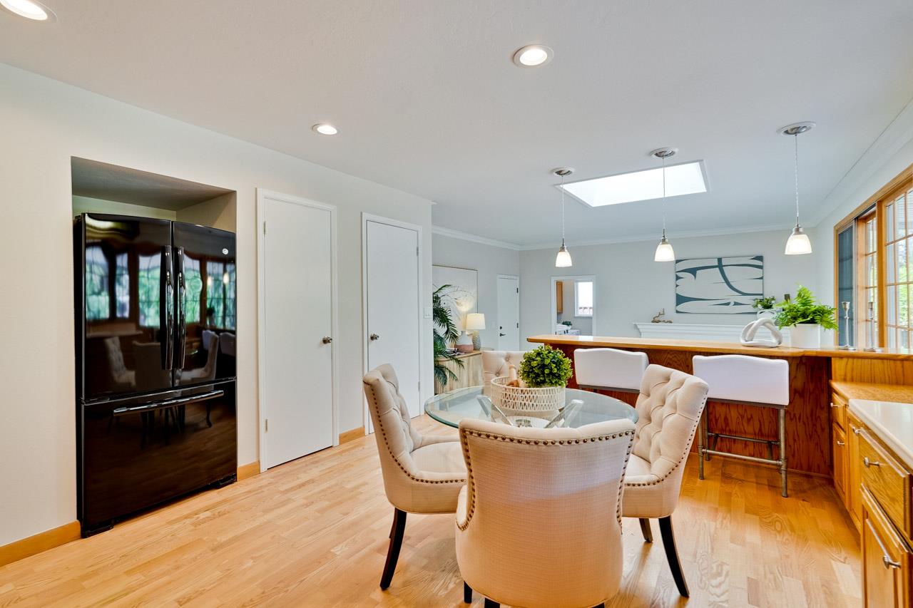 592 Torland Court Sunnyvale, CA 94087 - Photo 14 of 51 a dining room with furniture and wooden floor