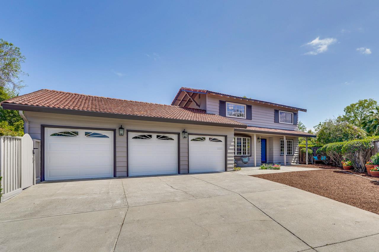 592 Torland Court Sunnyvale, CA 94087 - Photo 2 of 51 a front view of a house with a yard and garage