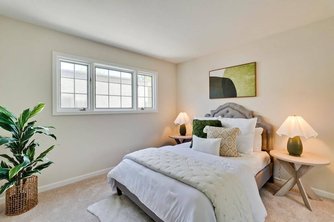 592 Torland Court Sunnyvale, CA 94087 - Photo 22 of 51 a bedroom with bed and a window
