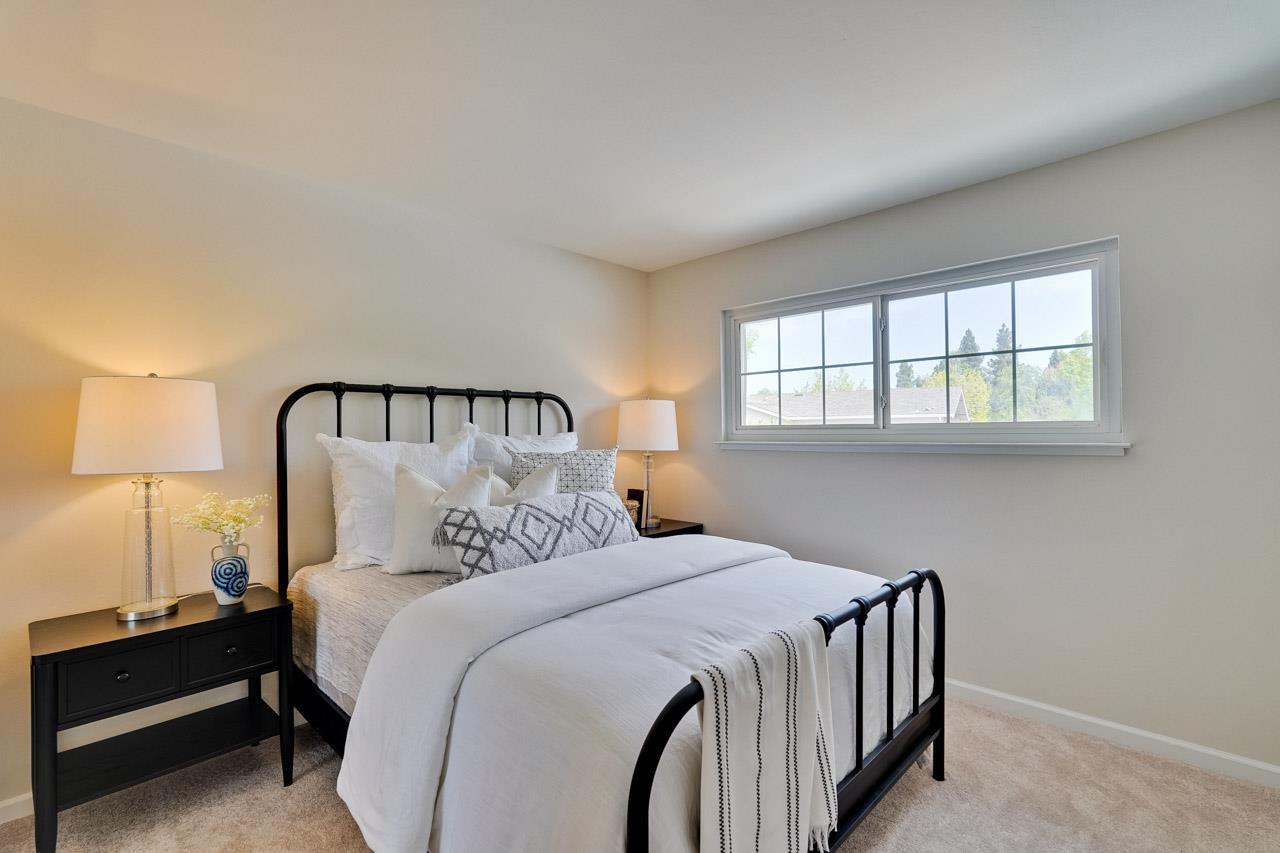592 Torland Court Sunnyvale, CA 94087 - Photo 27 of 51 a bedroom with a bed and window