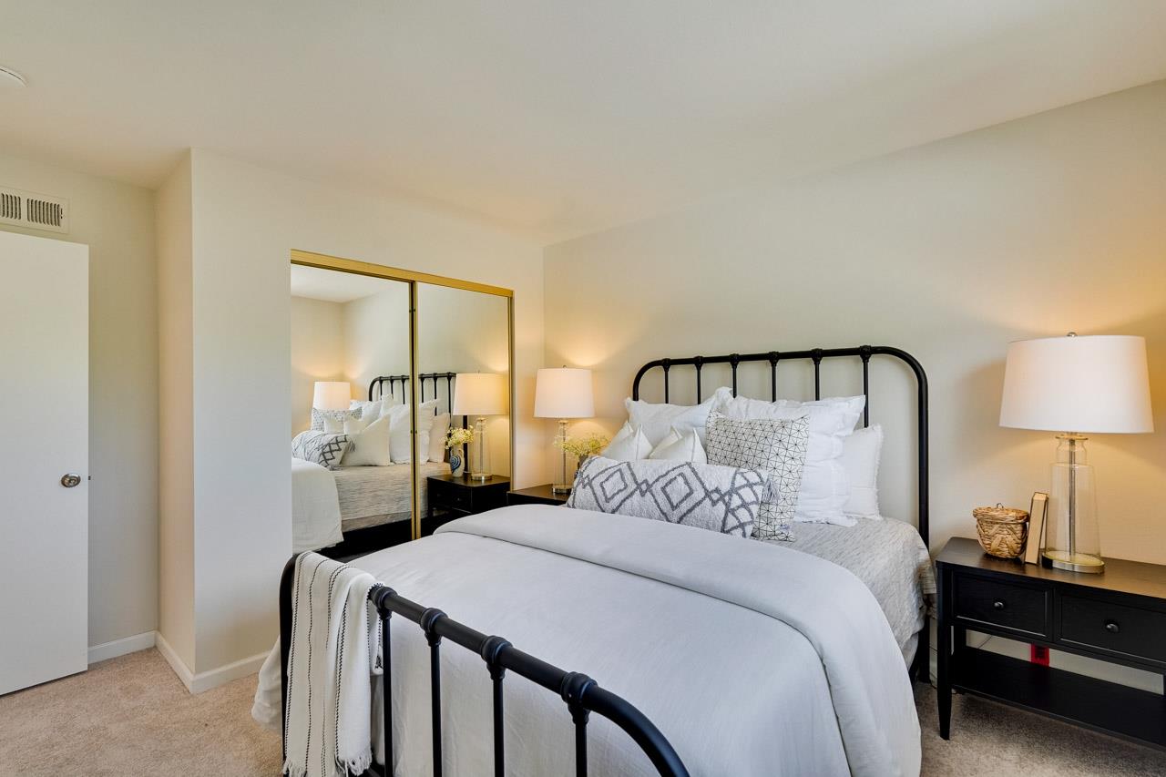 592 Torland Court Sunnyvale, CA 94087 - Photo 28 of 51 a bedroom with a bed and a lamp